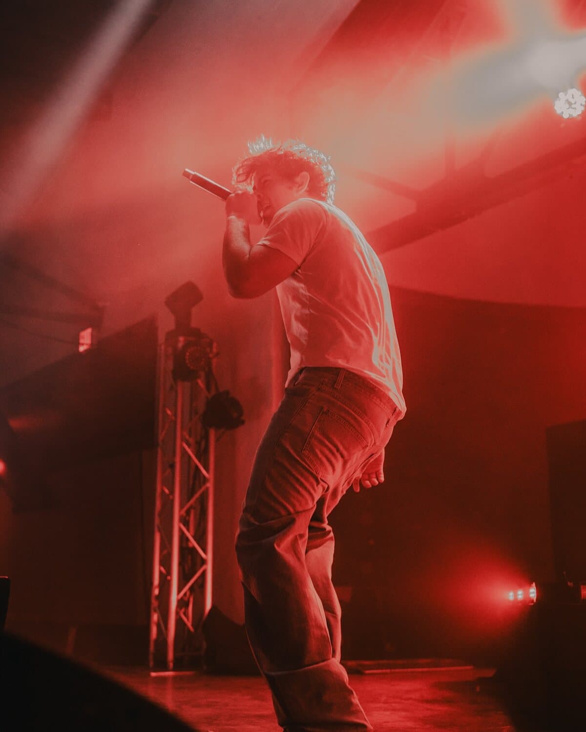 ian performing in red haze